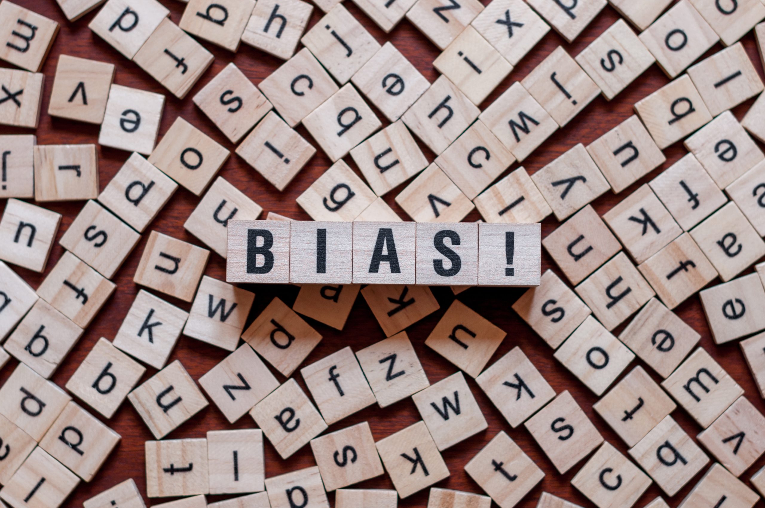 Wooden blocks with letters spelling out "Bias!"